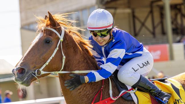 Apprentice jockey Ivy Lam celebrates a win. Picture: Makoto Kaneko