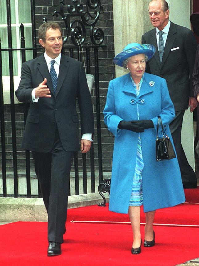 With Queen Elizabeth II. Picture: Getty Images