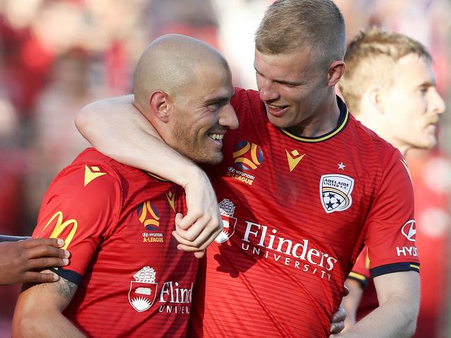 James Troisi is congratulated by Jordan Elsey after putting United back in front.