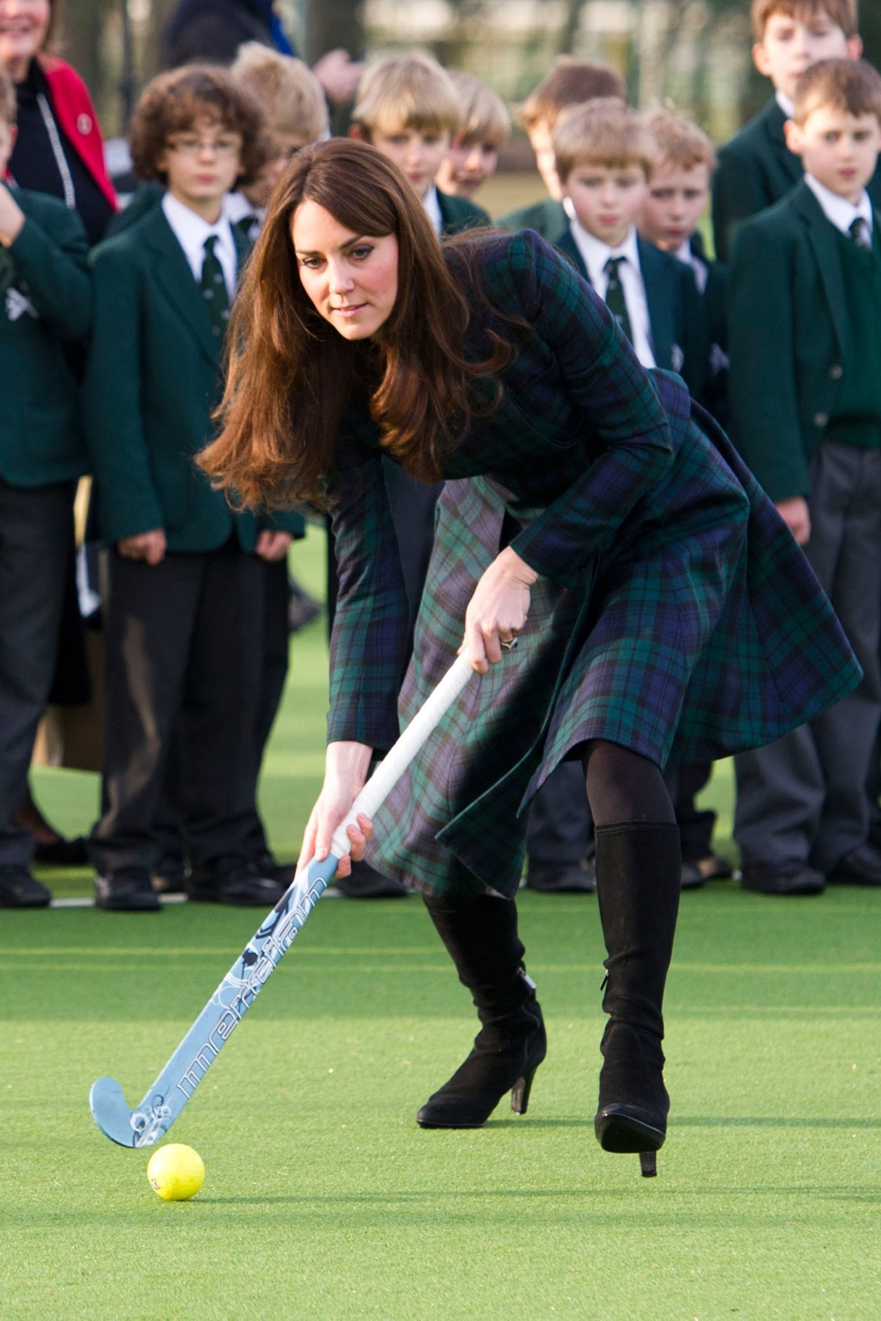 <p>Playing hockey at her former school. </p>