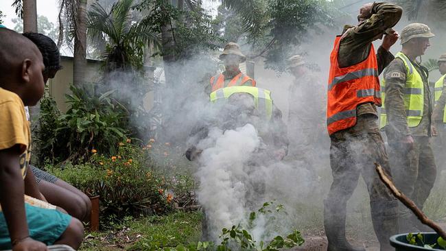 Australian Defence Force personnel take part in a traditional smoking ceremony at Bloomfield. Picture: Supplied