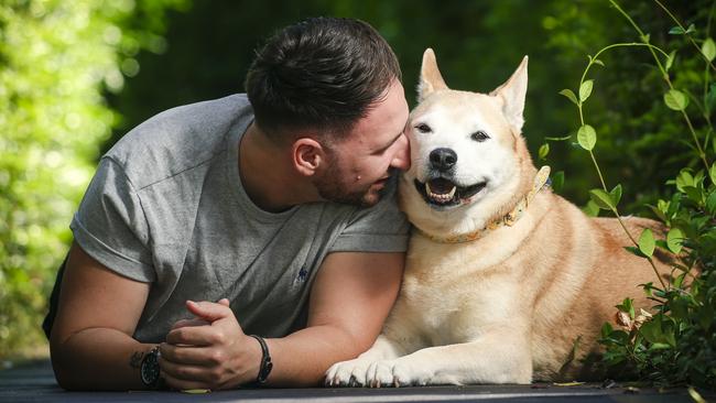 Asa Donehue with his dog Lexi. Picture: Glenn Campbell.