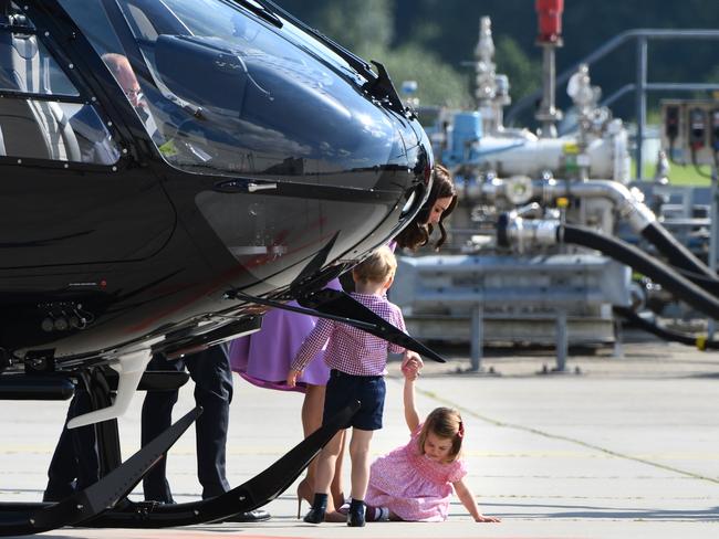 Princess Charlotte throws herself to the floor. Picture: Patrik Stollarz/AFP