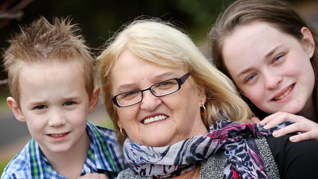 DI Potter, the widow of Fiskville whistle blower Brian Potter, has been nominated for a Pride of Australia award. Di Potter gave evidence to a parliamentary inquiry last month where she revealed the heartache she felt after losing her husband and the anger at the CFA who did nothing to warn fire fighters of the dangers. Di is pictured with two of her grandchildren, Noah, 6, and Mia, 12. Picture: Mark Stewart