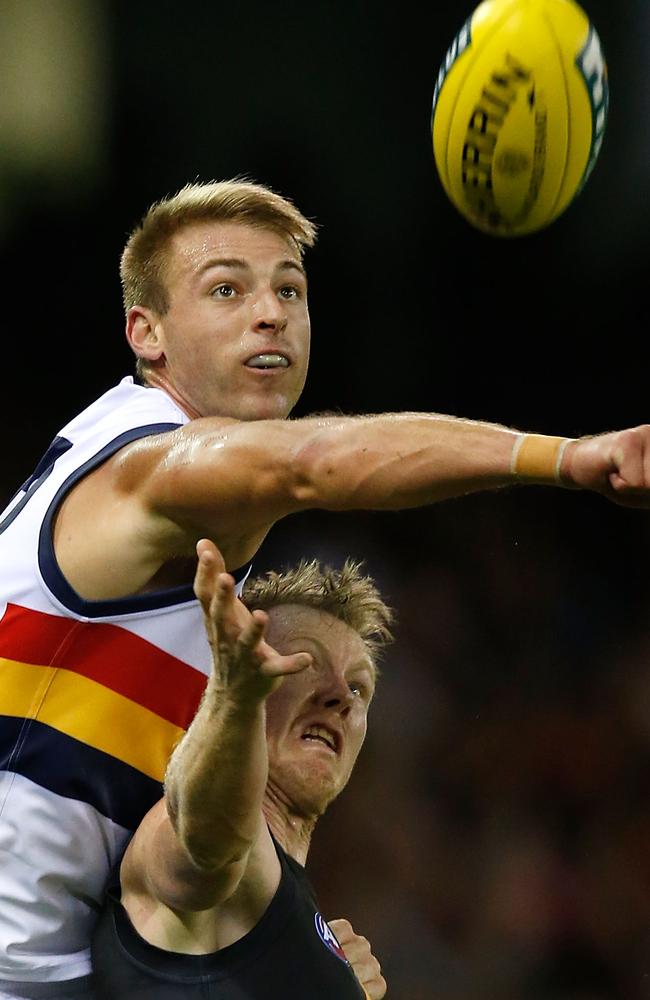 Daniel Talia denies Jack Riewoldt at Etihad Stadium. (Photo by Michael Willson/AFL Media/Getty Images)
