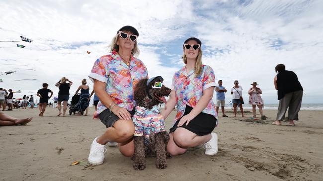 Tracey Ryan and Jess Parker enjoy a day out with the dog Charlie Bear at Port Douglas Carnivale's family beach day, held on Four Mile Beach. Picture: Brendan Radke