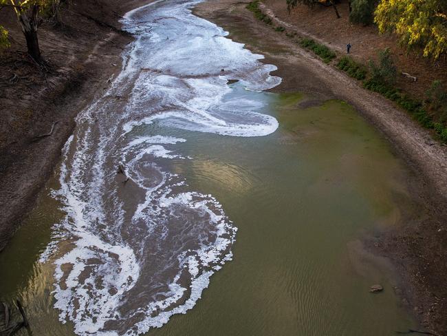 A new flow is seen meeting pools of green water along the Darling Barka river in Louth. Picture: Jenny Evans