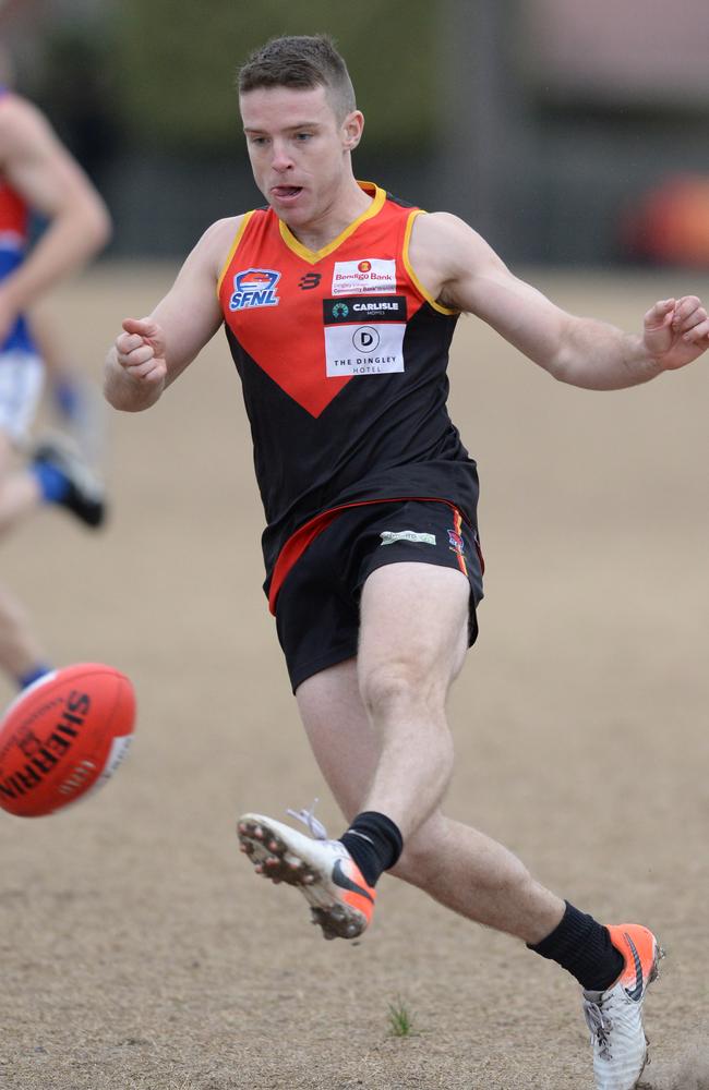 Chris Horton-Milne takes a kick for Dingley.