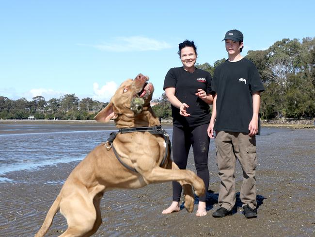 Bianca Fletcher and Noah Simpson, with pup Samson, Dog Gallery, at Sandgate Beach, Saturday 27th August 2022 - Photo Steve Pohlner