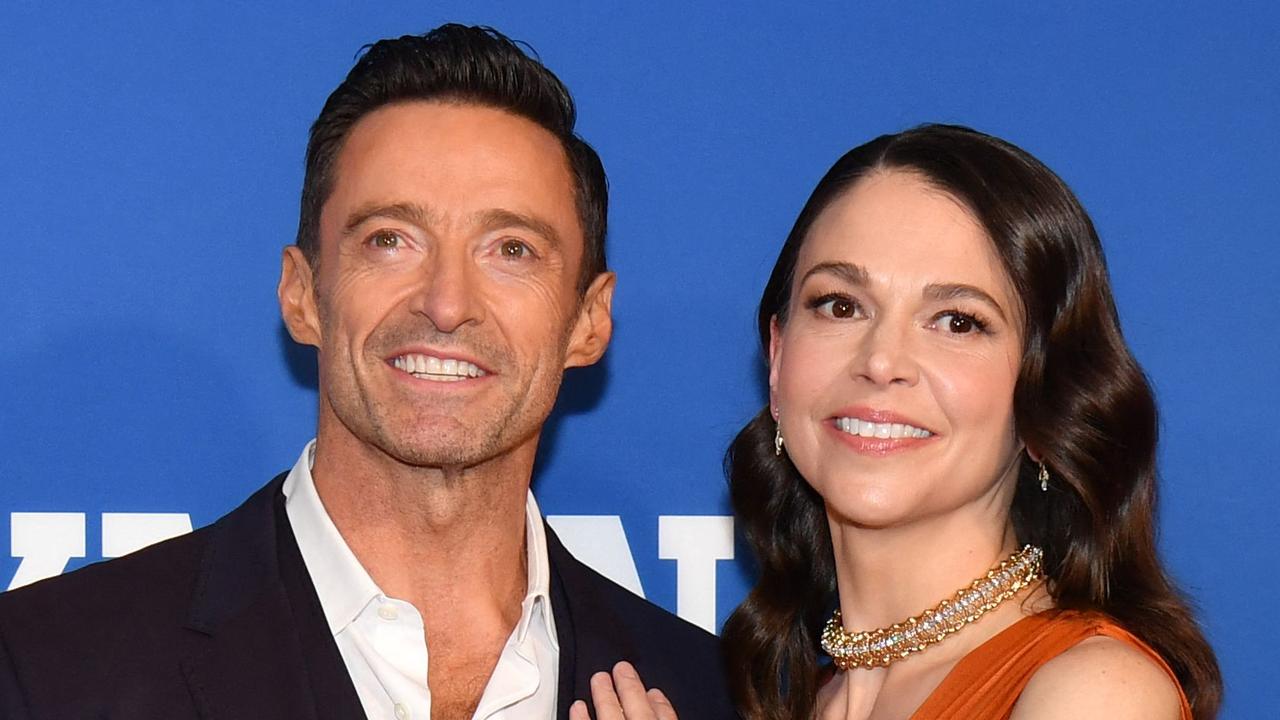 Australian actor Hugh Jackman and US actress Sutton Foster arrive for the opening night of Broadway music-hall "The Music Man" at Winter Garden Theater in New York City on February 10, 2022. (Photo by ANGELA  WEISS / AFP)