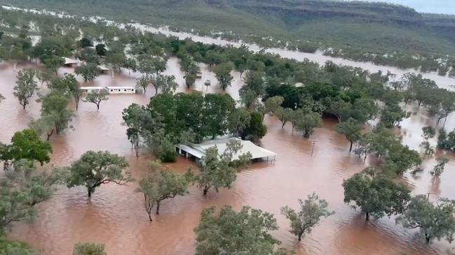 A chopper flying over the Victoria River Roadhouse reveals the extent of the flooding as a Watch and Act notice is issued for the area. Picture: Supplied.