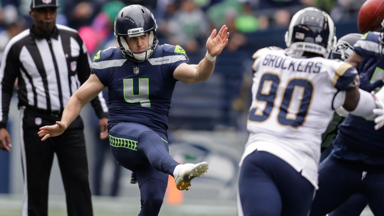 Seattle Seahawks punter Michael Dickson (4) on the sideline before an NFL  football game against the