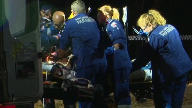 Paramedics treat the teen in Ingleburn. Picture: TNV