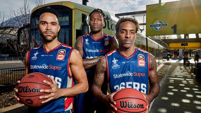 Daniel Dillon, Eric Griffin and Deshon Taylor outside the Entertainment Centre where the 36ers will play their home games this season. Picture: Matt Loxton.