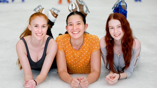 Erin McGiffen, 21, Michelle Kezerle, 19, Rebecca McGiffen, 18, at Macquarie Ice Rink this month. Picture: Angelo Velardo