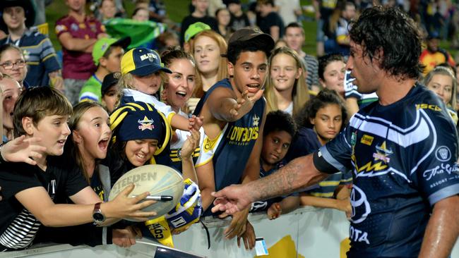 Johnathan Thurston hands out his headgear. NRL; North Queensland Cowboys Vs Canberra Raiders at 1300Smiles Stadium, Townsville. Pictre: Alix Sweeney