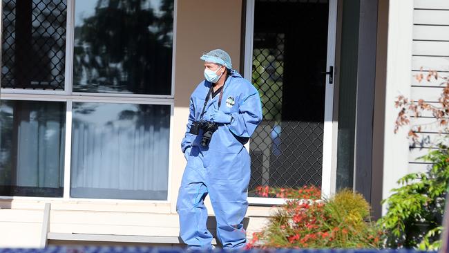 The scene of a Lillian Crescent, Ashmore home after Trevor Schneider’s body was found. Picture Richard Gosling