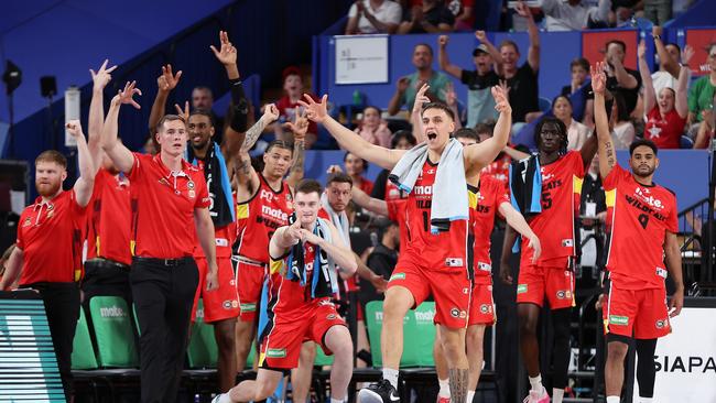 The Wildcats celebrate a basket by Bryce Cotton during an NBL match. Picture: Paul Kane/Getty Images