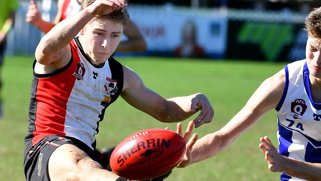 The Morningside player Finn Raymond gets a kick awayColts QAFL Australioan football match between Morningside and Mt Gravatt at Jack Esplen OvalSaturday May 28, 2022. Picture, John Gass