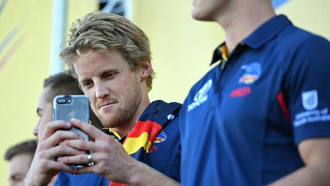 Rory Sloane tries to call AFL House to find out what type of free agent he is. Picture: Tom Huntley