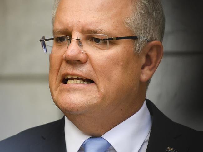 Australian Prime Minister Scott Morrison speaks to the media during a press conference at Parliament House in Canberra, Friday, March 27, 2020. (AAP Image/Lukas Coch) NO ARCHIVING