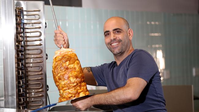 Kuranda's popular Falafellicious Cafe opened in a new location at Smithfield Shopping Centre. Falafellicious owner Or Ben Ezra sets up the first kebab. Picture: Stewart McLean