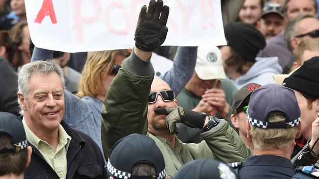 No Room for Racism protesters face off with Unted Patriots Front members at a rally in Bendigo - UPF protest against a Mosque being built in Bendigo. A UPF Protester gives the Nazi salute. Picture: Jake Nowakowski