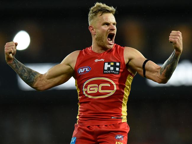 APAC Sports Pictures of the Week - 2020, July 27 - GOLD COAST, AUSTRALIA - JULY 23: Brandon Ellis of Gold Coast Suns  celebrates kicking a goal during the round 8 AFL match between the Gold Coast Suns and Western Bulldogs at Metricon Stadium on July 23, 2020 in Gold Coast, Australia. (Photo by Matt Roberts/AFL Photos/via Getty Images)