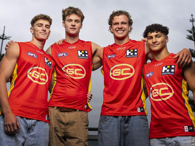 MELBOURNE, AUSTRALIA - NOVEMBER 21: (L-R) Will Graham, Ethan Read, Jed Walter and Jake Rogers of the Suns pose for a photograph following the 2023 AFL Draft at Marvel Stadium on November 21, 2023 in Melbourne, Australia. (Photo by Daniel Pockett/Getty Images)