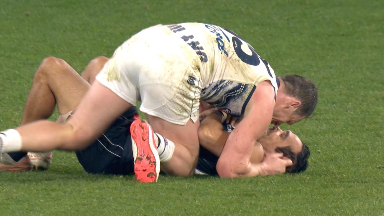 Eddie Betts and Patrick Dangerfield on Saturday at the MCG.