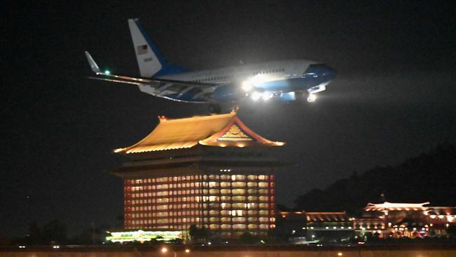 A US military aircraft with Nancy Pelosi on board prepares to land at Sungshan Airport in Taipei. Picture: AFP.