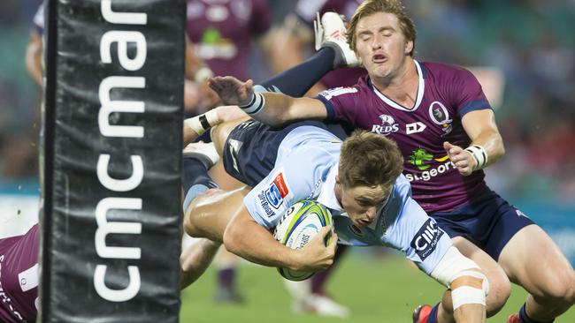 Queensland can’t stop Alex Newsome scoring a try.