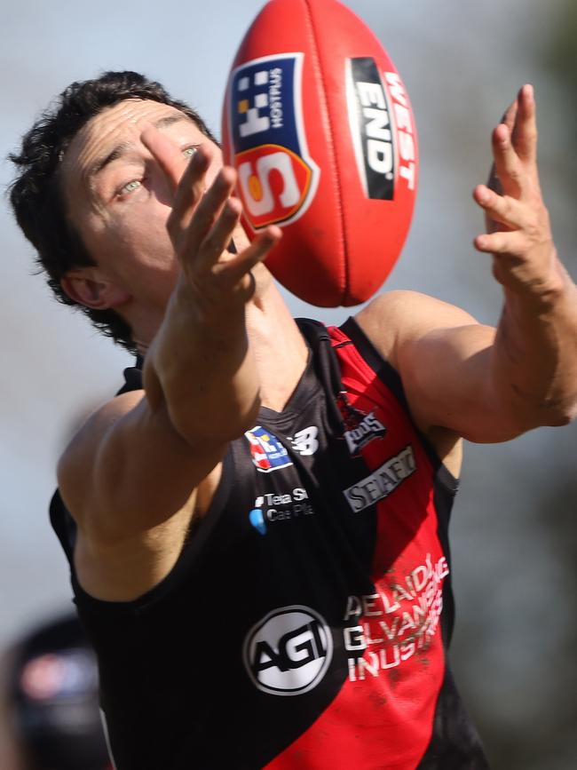 West Adelaide captain Tom Keough has his eyes only for the ball against North Adelaide at Prospect Oval. Picture: SANFL Image / David Mariuz