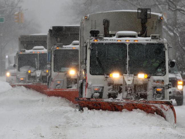 Daily Telegraph photographer Nathan Edwards braves the blizzard during ...