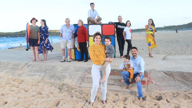 Federal Budget 2021: left to right, young singles Kirsten Ford and Jacob Thaning; retirees John and Margaret Wills; student Kurt Cheng (top); young family Fabio Stefanelli and Michela Maroni (front); established family Mark Horn and Michelle Duncan; pre retiree Lan Vo. Photo: John Feder/The Australian.