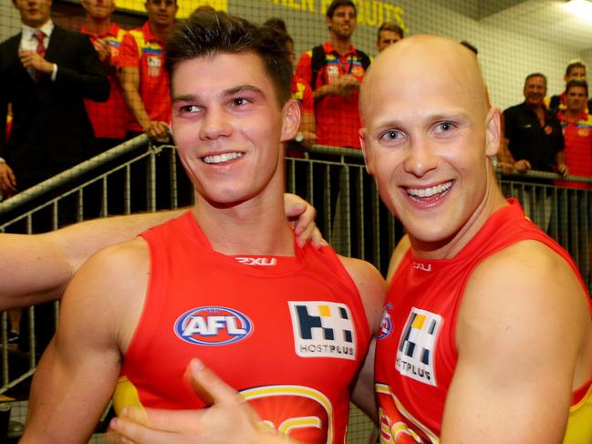 Jaeger O'Meara and Gary Ablett of the Suns celebrate winning the AFL match between the Gold Coast Suns and the Richmond Tigers. Pic Darren England.