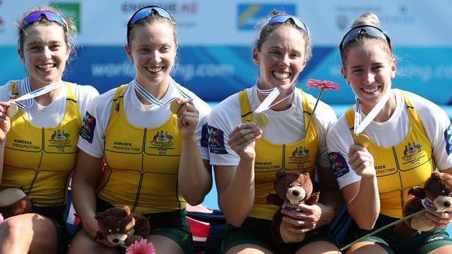 Olympia Aldersey, Katrina Werry (second left), Sarah Hawe and Lucy Stephan of Australia pose after winning the gold in the women's four final at the World Rowing Championships on August 31. Photo by Naomi Baker/Getty Images