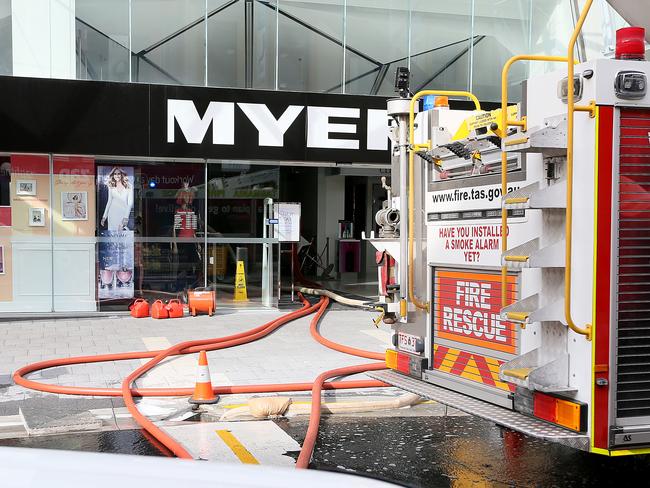 a building has collapsed next to the Myer redevelopment site in Murray St Hobart. water being pumped out of Myer in Liverpool St. Picture: SAM ROSEWARNE