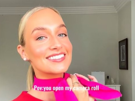 Qantas flight attendant getting ready for a flight
