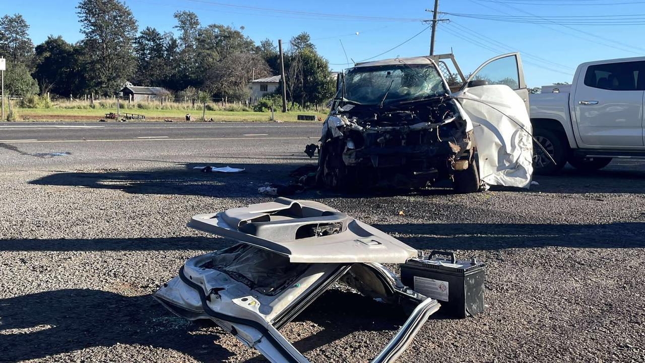 Highway closed after truck rolls in crash with car