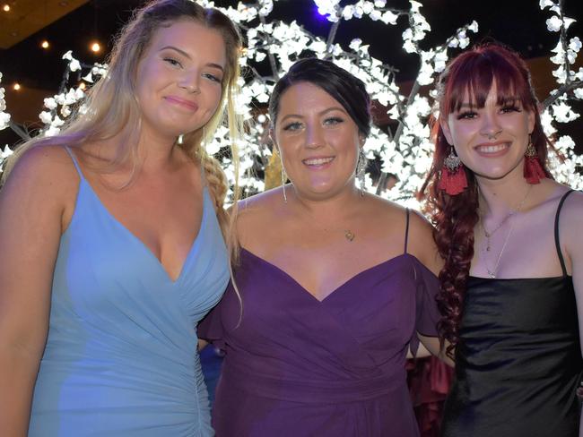 Alexia Brownsey, Ashlee Eckford and Kalea Petterwood at the Mackay North State High School Year 12 formal at the Mackay Entertainment and Convention Centre, Saturday November 21, 2020. Picture: Heidi Petith