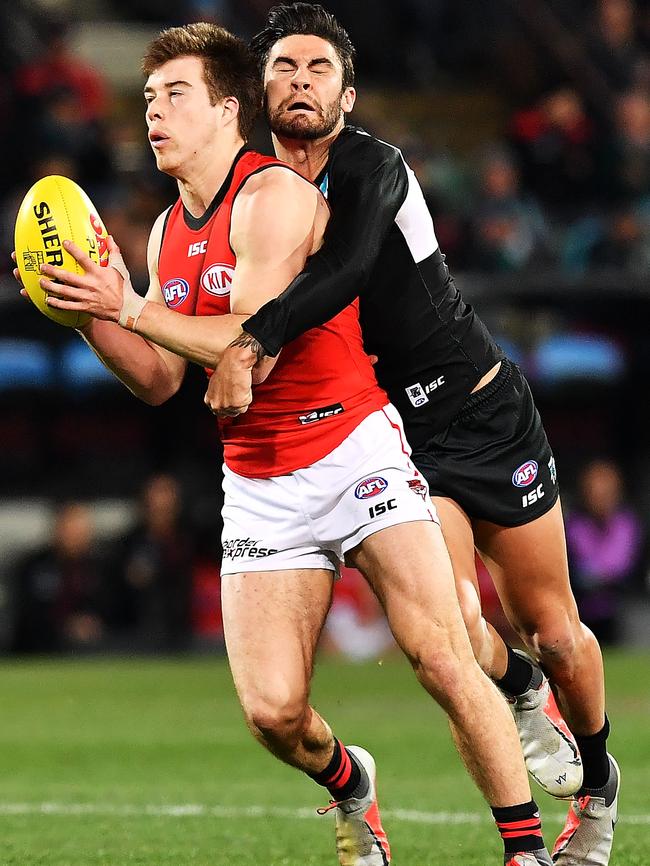 Chad Wingard tackles Zach Merrett on Friday night. What will Port do with him next year? Picture: Mark Brake/Getty Images