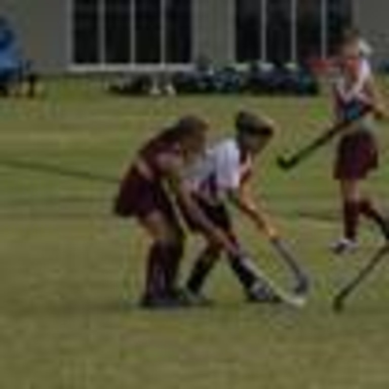 Gold Coast hockey player Rosie Malone playing for south coast at the schools state champs in Toowoomba against Bec Greiner (then playing for wide bay) who is now also in the Hockeyroos.