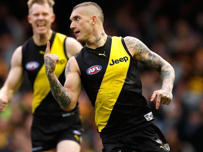 MELBOURNE, AUSTRALIA - JULY 16: Dustin Martin of the Tigers celebrates a goal during the 2017 AFL round 17 match between the Richmond Tigers and the Brisbane Lions at Etihad Stadium on July 16, 2017 in Melbourne, Australia. (Photo by Adam Trafford/AFL Media/Getty Images)