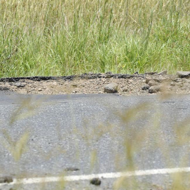 Significant road damage and potholes such as this one on the Bruce Highway, Benaraby are present across the region. Picture: Brenda Strong