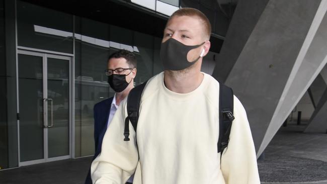 Collingwood’s Jordan de Goey arrives back in Australia.