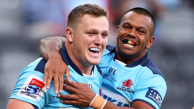 Angus Bell and Kurtley Beale celebrate a Waratahs try against the Lions. Picture: Getty Images