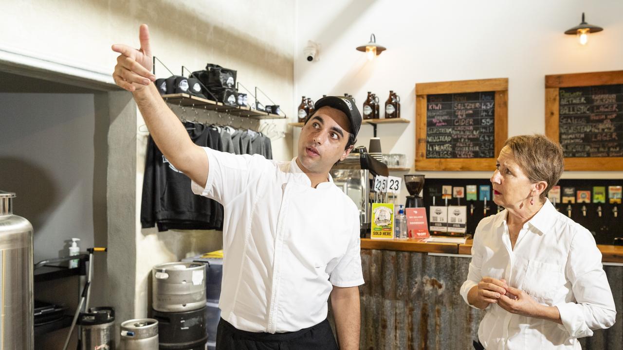 TOOWOOMBA FLOODS: Flaming Knights owner and 4 Brothers Brewing executive chef Mark Aboud talks to Queensland Minister for Employment and Small Business Di Farmer as she tours Toowoomba businesses impacted by floods, Wednesday, March 9, 2022. Picture: Kevin Farmer