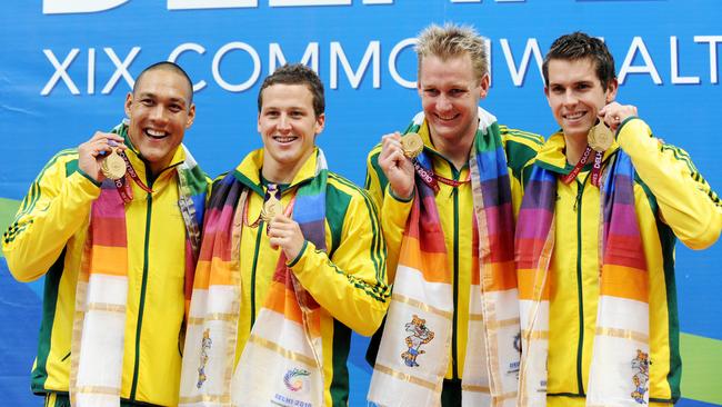 Australia's the Men's 4x100m Medley Relay Final winning team (left to right) Geoff Huegill, Ashley Delaney, Brenton Rickard and Eamon Sullivan celebrate during the XIX Commonwealth Games at the Dr SPM Aquatics Complex in Delhi, India on Saturday, Oct. 9, 2010. Picture: Tracey Nearmy.