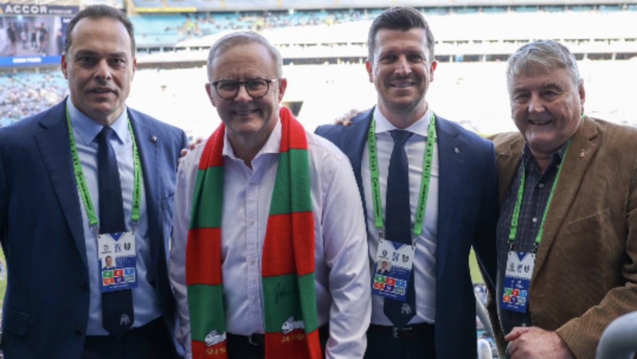 Australian Prime Minister Anthony Albanese flanked by Bulldogs chairman John Khoury (left), CEO Aaron Warburton and major sponsor Arthur Laundy.